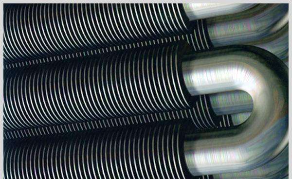 Helical fin tubes with solid fins