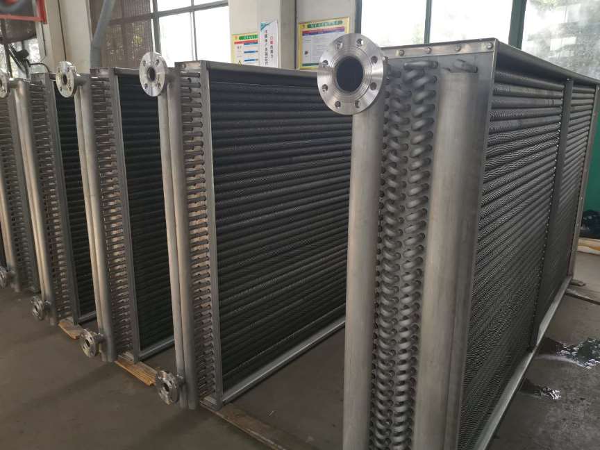 Finned tube bundles for steam boilers