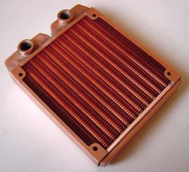 Integral copper finned tube radiator